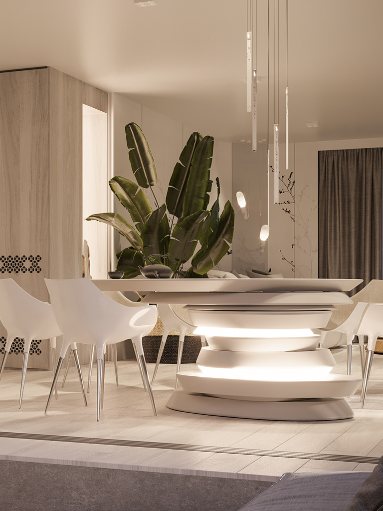 The layered dining table glowing beneath slender pendant lights, with white chairs and a banana plant