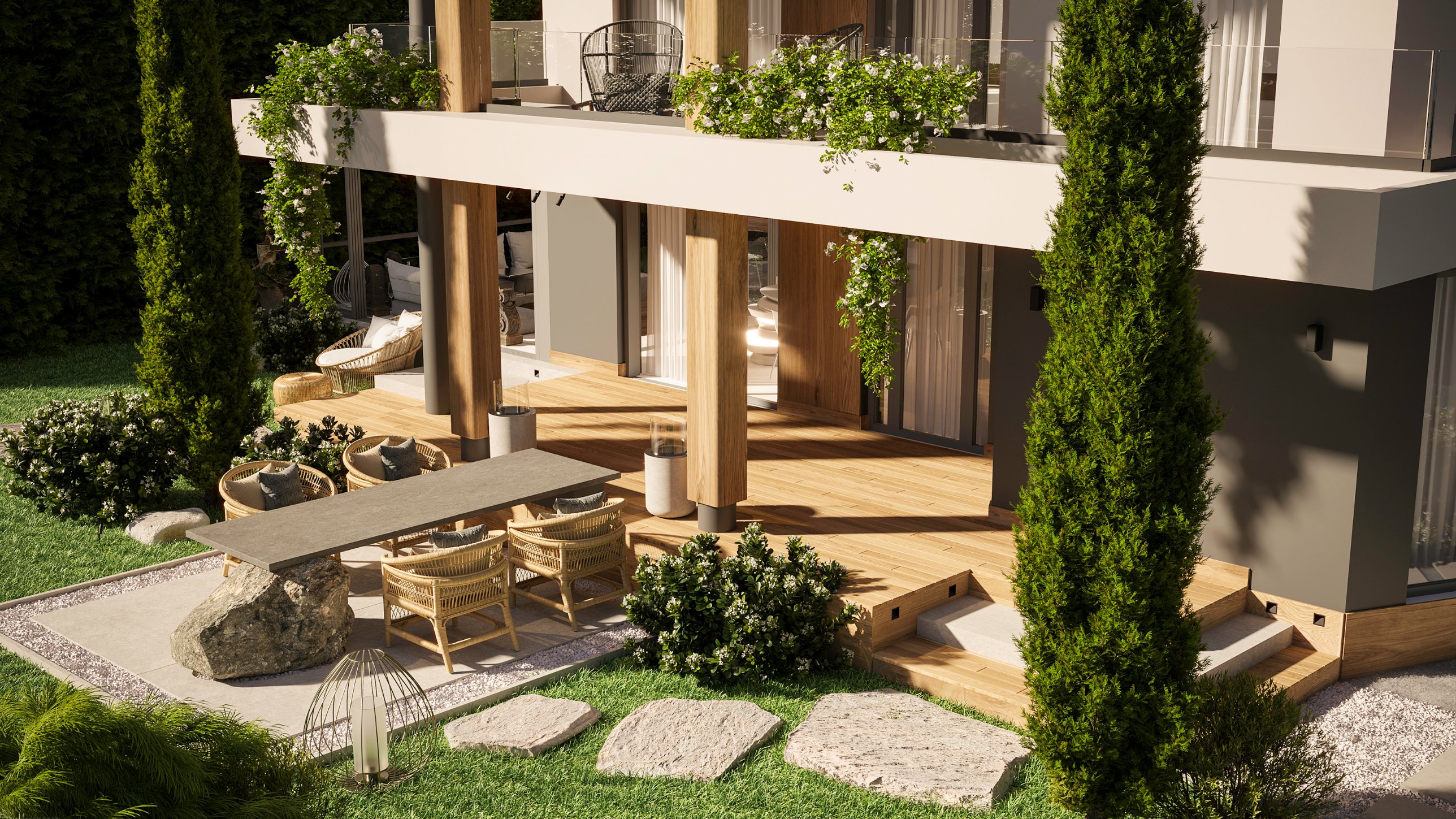 The terrace and timber deck from above, with stepping stones across the lawn