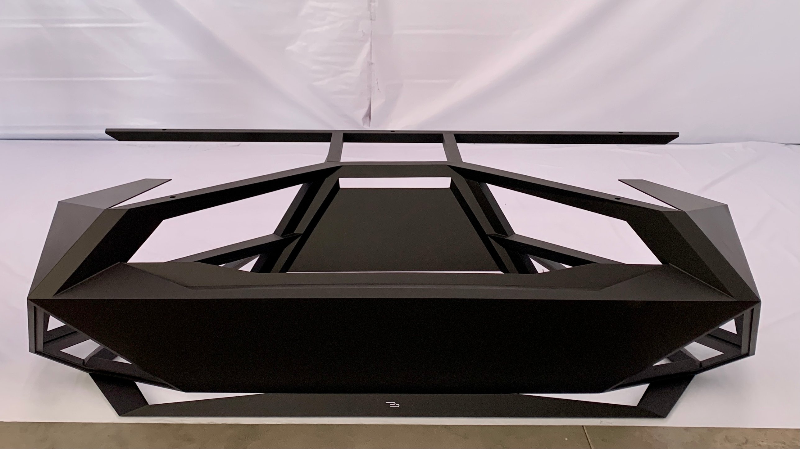 The finished desk in the studio, front view with the Bozhinovski mark