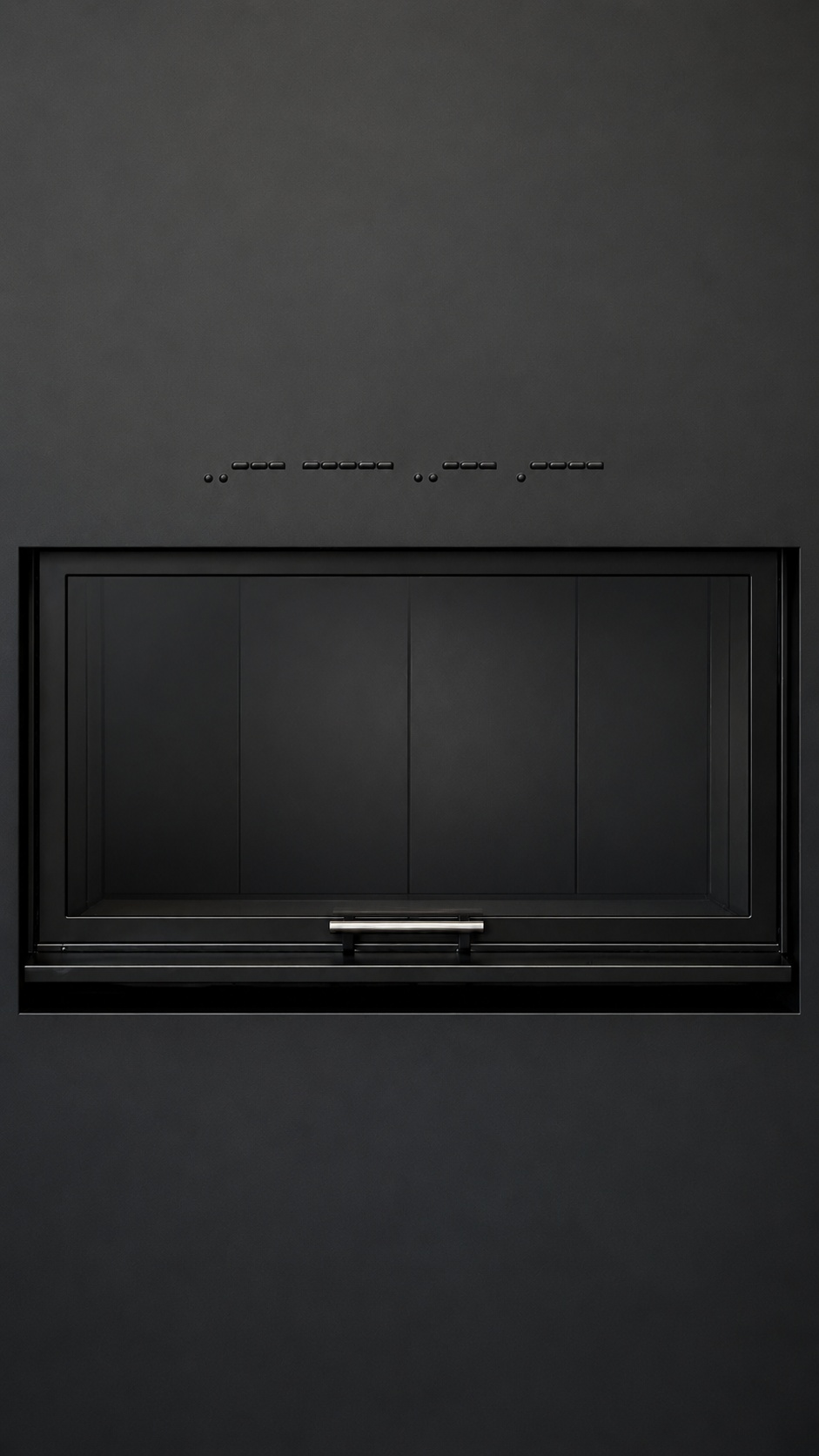 Morse code for 2021 inscribed in the black fireplace wall above the firebox