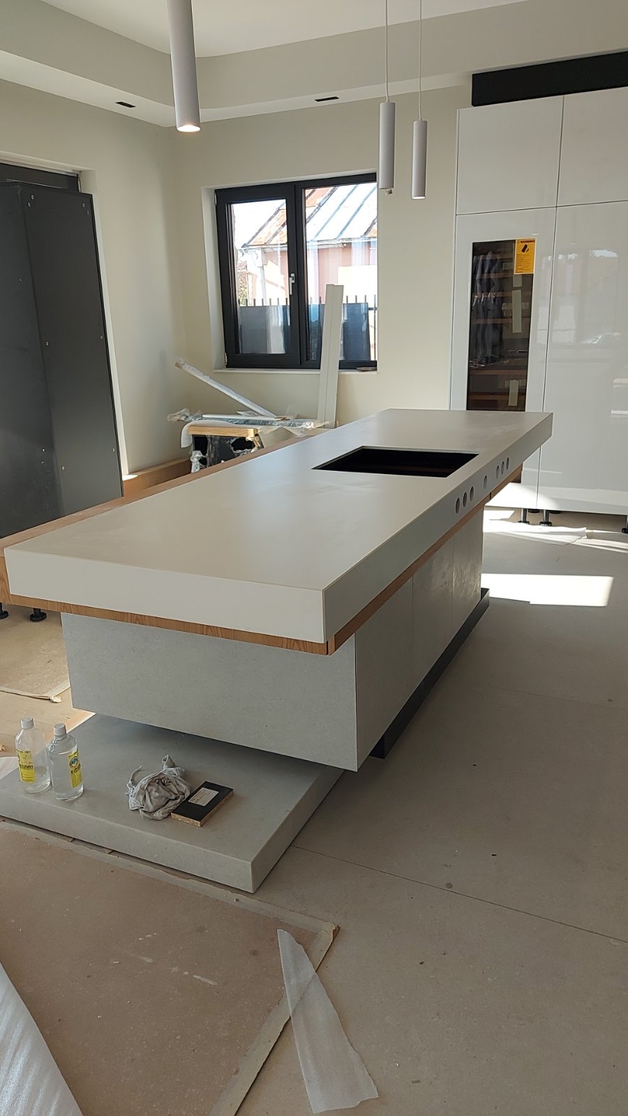 The white island top being fitted