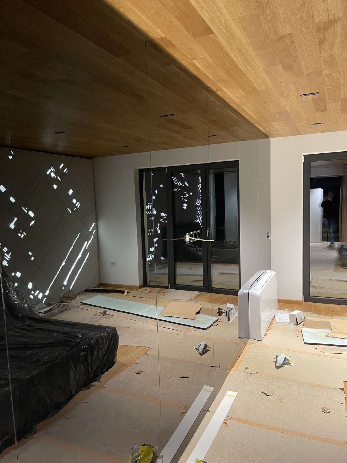 The bedroom wall reflected during installation