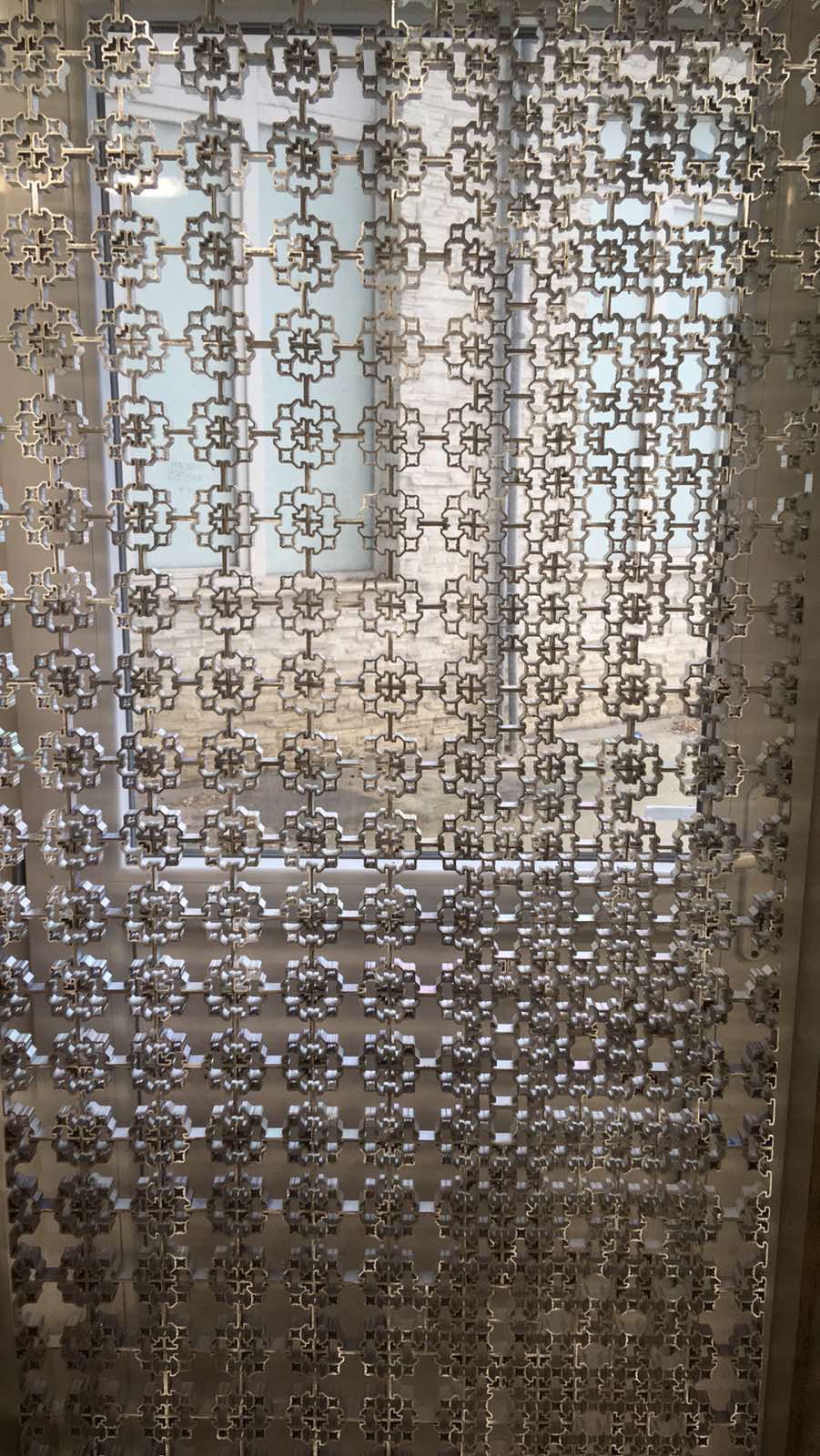 A perforated metal screen panel